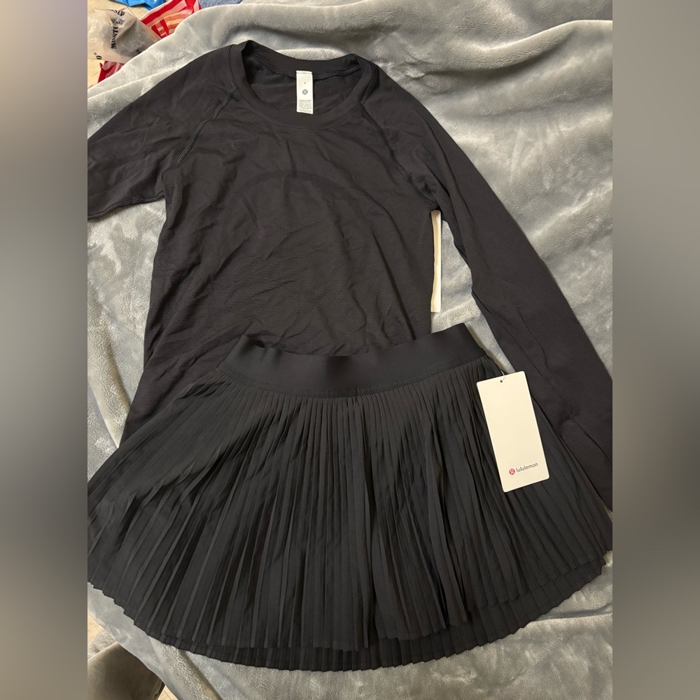 lululemon athletica black long sleeve with matching skirt $100